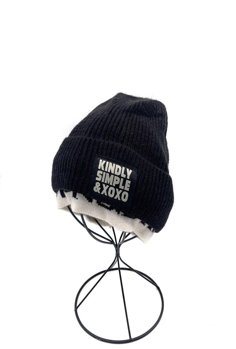 Thick lined beanie with writing on the front